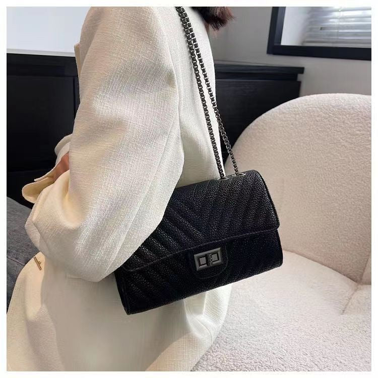 Obsidian Textured Chain Flap Bag