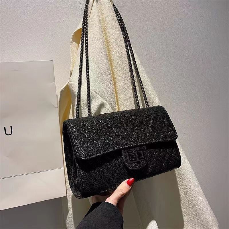 Obsidian Textured Chain Flap Bag