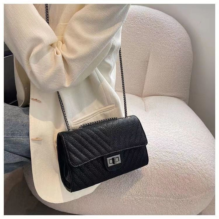 Obsidian Textured Chain Flap Bag